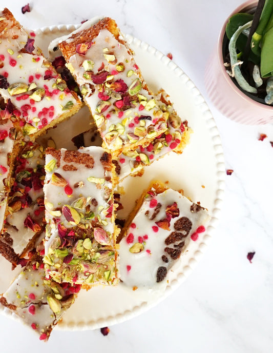Gluten free lemon, pistachio & rose polenta cake