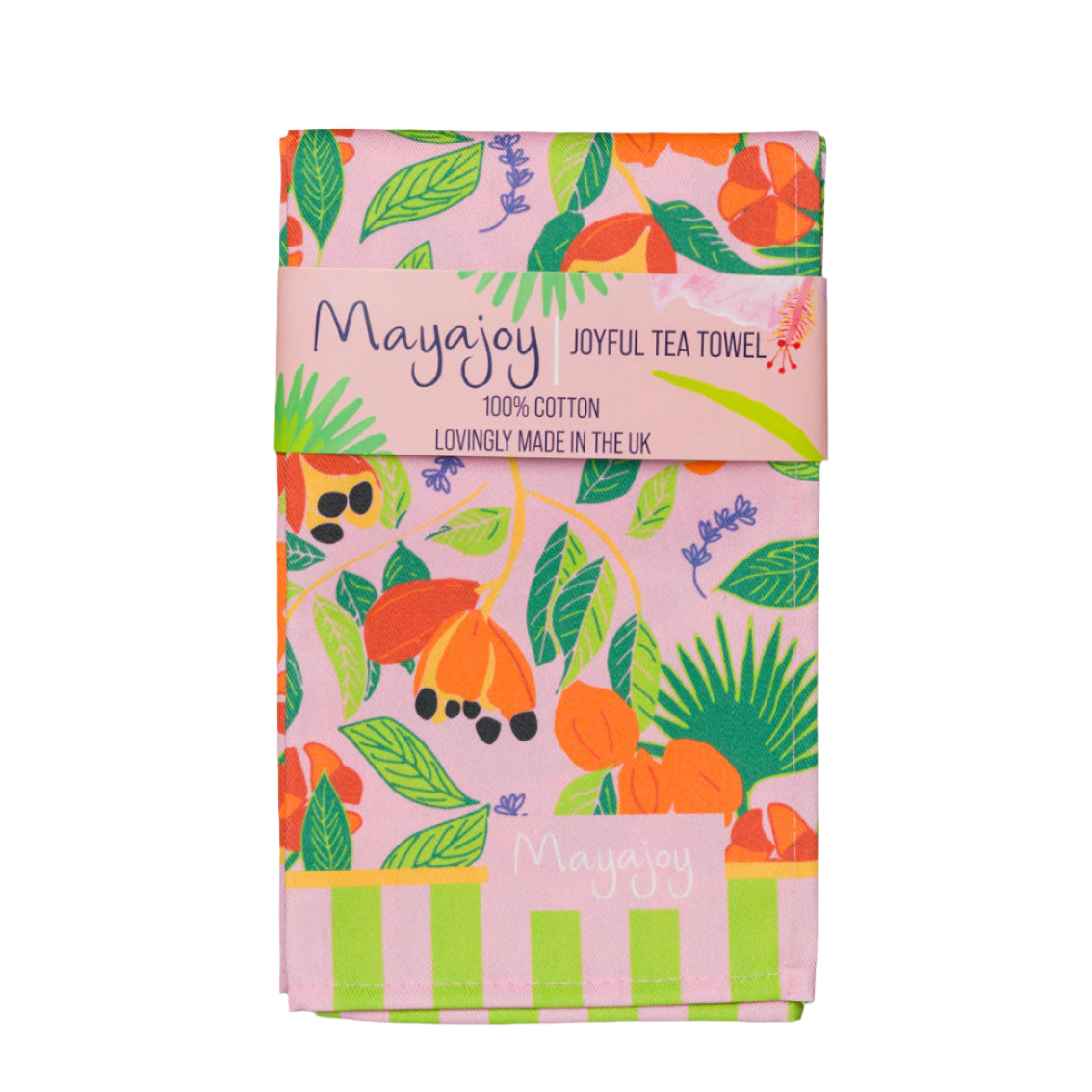 Mayajoy colourful cotton tea towel with hand illustrated ackee design with pink background, green leaves and orange ackee with lilac thyme leaves folded with coral belly band and words “joyful tea towel”