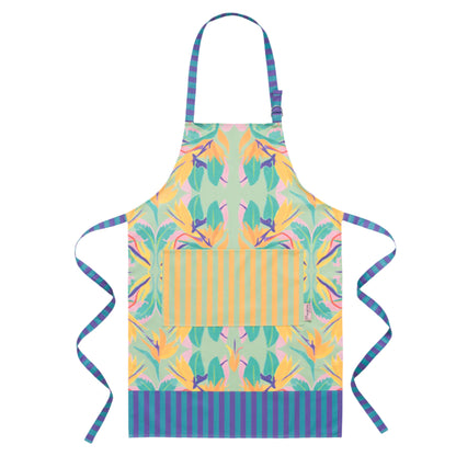 Flat lay women’s apron in birds of paradise design, in colours green, orange, pink and purple, with striped pocket and ties 