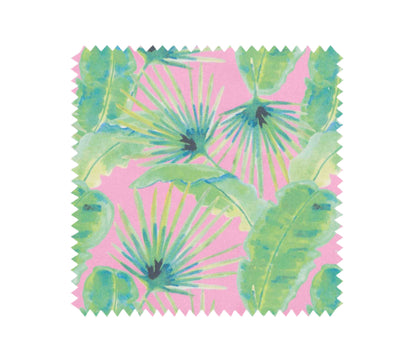 Colourful swatch for pink palm stripe apron in pink and green tropical foliage design 