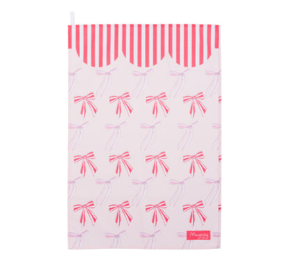 Mayajoy xmas bows flat lay tea towel in red and pink with festive bows and red and white candy stripe scallop design to edge